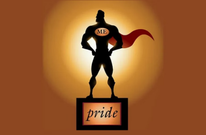 A silhouette of a muscular superhero with a cape, standing on a pedestal labeled 'pride', with the text 'ME' on the chest, against a glowing background.